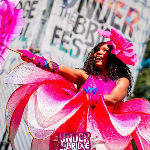 Festival stilt walkers in theme