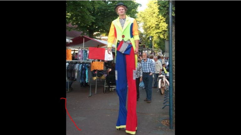 Clown on stilts