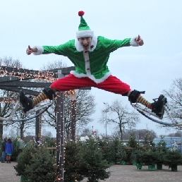 Christmas elf Stilt Runner (jumping stilts)