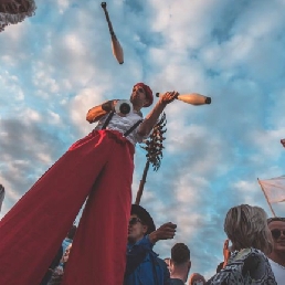 Stiltwalkers in fancy dress