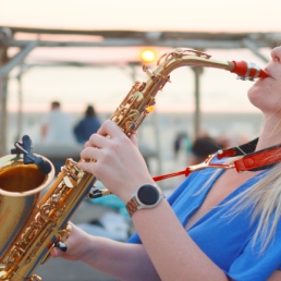 Monique on Sax with All-round DJ