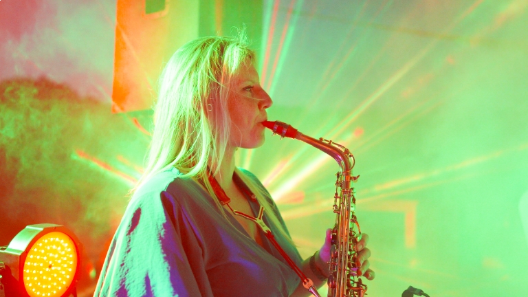 Monique on Sax with All-round DJ