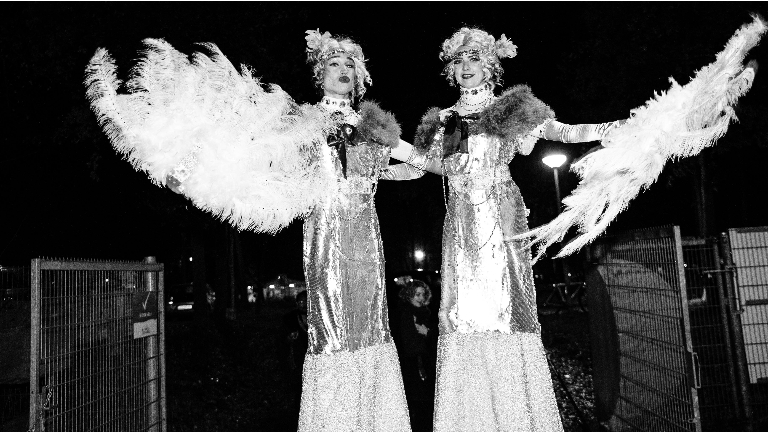 Roaring Ladies stilt walkers