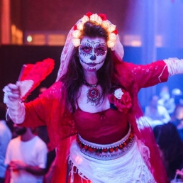 Dias de los muertos stilt walkers