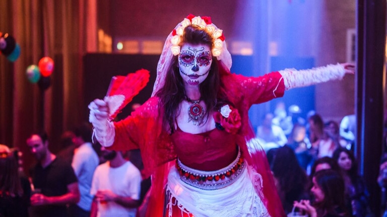 Dias de los muertos stilt walkers