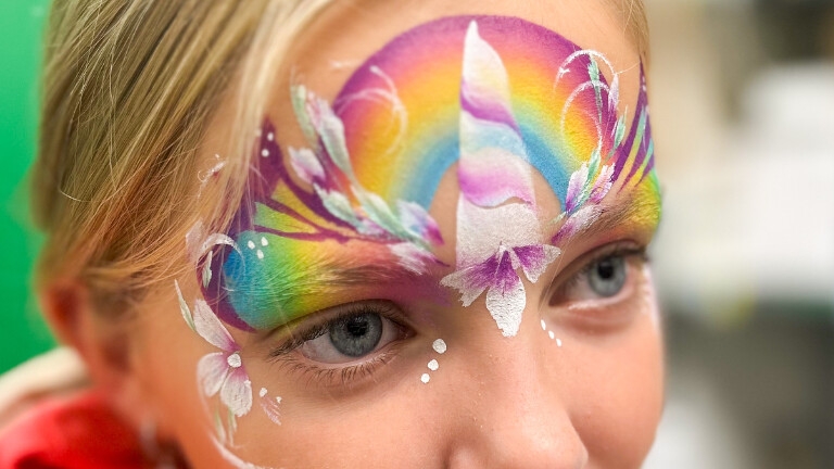 Colorful face paint with Drops & Dots